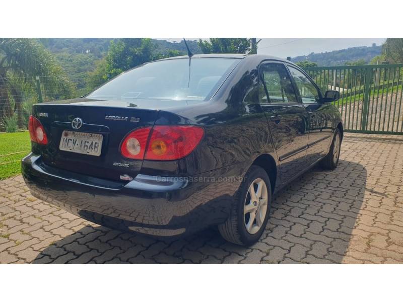 TOYOTA - COROLLA - 2003/2004 - Preta - R$ 35.990,00